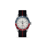 Tudor GMT watch with stainless steel case, vibrant bezel, white dial, and sporty fabric strap.