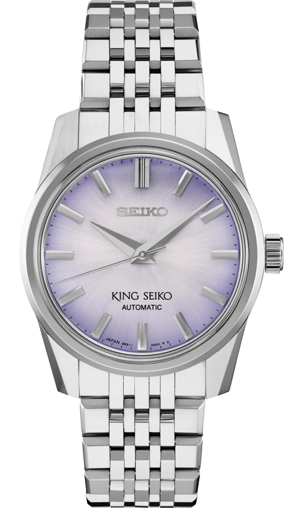 Stainless steel Seiko watch with a gradient lavender-purple dial and modern design.