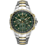 Elegant Seiko Coutura watch with green dial, gold accents, and world timer features.