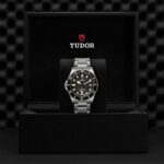 Luxury Tudor diving watch displayed in an elegant black presentation box.