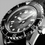 Seiko divers watch with black ceramic bezel, automatic movement, and 200m water resistance.