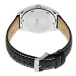 Stylish Seiko wristwatch with polished stainless steel case back and black leather strap.