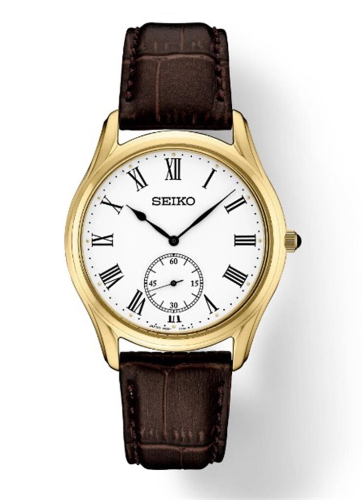 Elegant Seiko wristwatch in gold with white dial, Roman numerals, and brown leather strap.