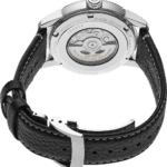 Elegant Seiko mechanical watch with stainless steel case, leather strap, and visible intricate movement.