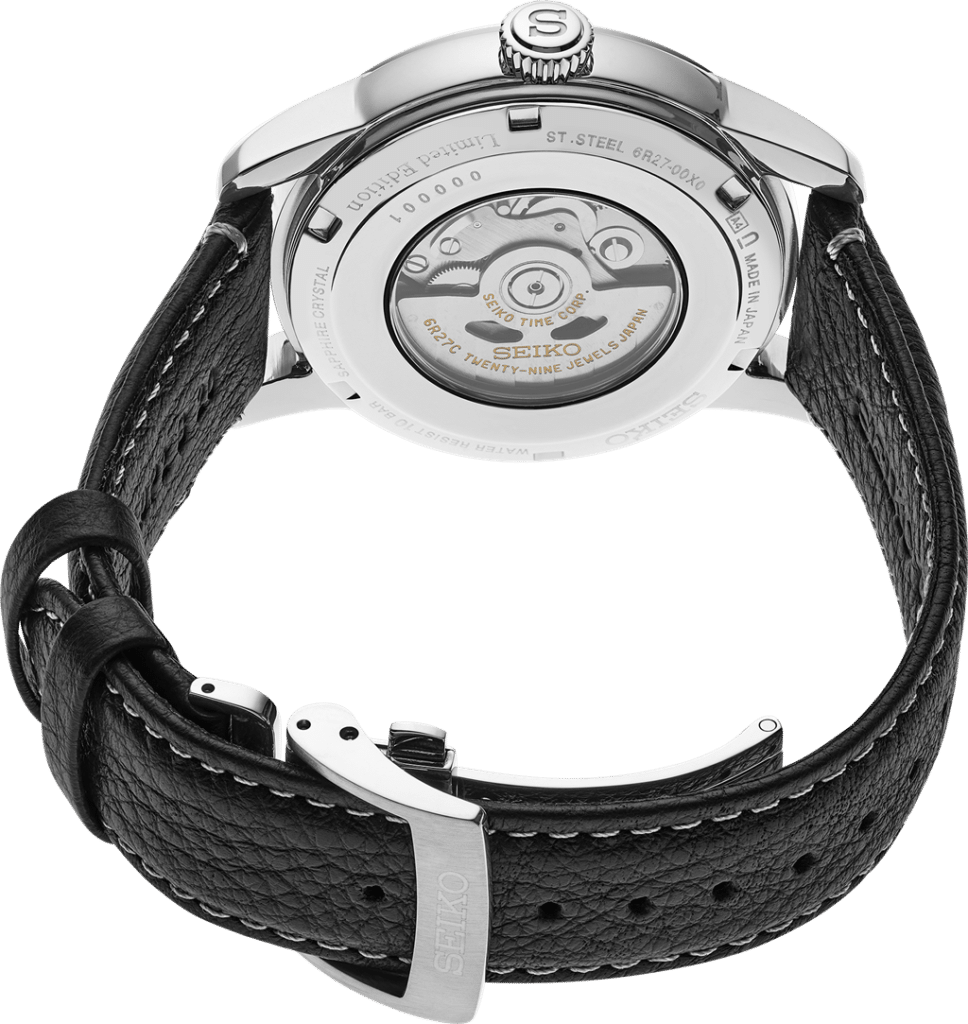 Elegant Seiko mechanical watch with stainless steel case, leather strap, and visible intricate movement.