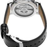 Seiko watch with transparent case back, polished stainless steel, and luxurious black leather strap.