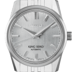 Elegant Seiko automatic watch with polished stainless steel case and minimalist silver dial.
