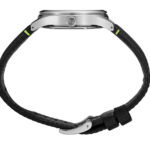 Sleek stainless steel wristwatch with textured strap and neon green accents for modern style.