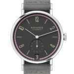 Stylish Nomos Glashütte watch in stainless steel with charcoal dial and green textile strap.