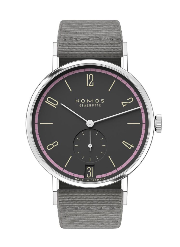 Stylish Nomos Glashütte watch in stainless steel with charcoal dial and green textile strap.
