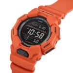 Vibrant orange Casio G-Shock watch, durable and sporty, perfect for outdoor adventures.