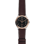 Elegant Tudor wristwatch with stainless steel case and rose gold bezel, featuring a leather strap.