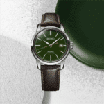 Elegant Seiko Presage watch with green dial and leather strap, showcasing luxury and craftsmanship.