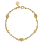 Elegant gold bracelet with intricate links and beads, perfect for any occasion.