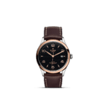 Elegant Tudor watch with polished stainless steel case and rose gold bezel on leather strap.
