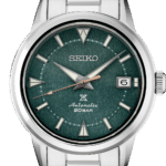 Elegant Seiko wristwatch with green textured dial and stainless steel bracelet. Perfect for any occasion.