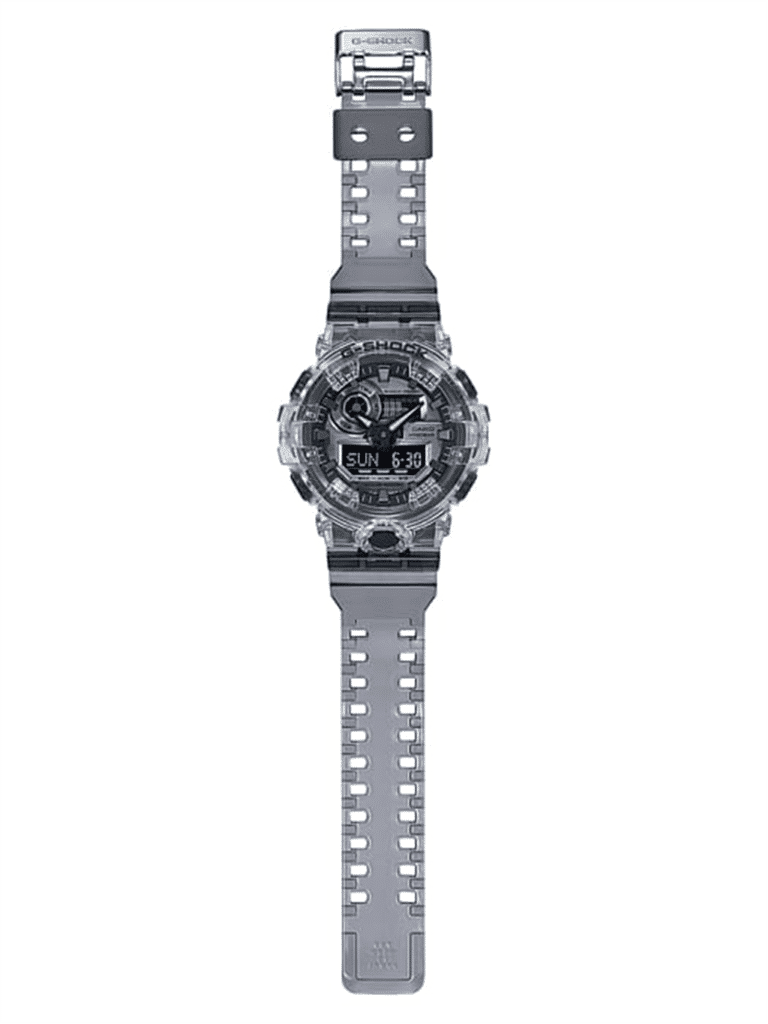 Durable G-Shock watch featuring transparent casing and sporty design with analog-digital displays.