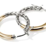 Elegant hoop earrings featuring gold and silver finishes with unique designs. Perfect for any occasion.