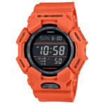 Vibrant orange Casio G-Shock watch with digital display and durable silicone strap for outdoor use.