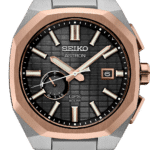Elegant Seiko Astron GPS Solar watch with rose gold accents and black textured dial.