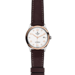 Elegant Tudor watch with rose gold accents, white dial, and brown leather strap.