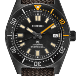 Seiko diver’s watch with black dial, luminous markers, unidirectional bezel, and durable textile strap.