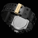 Stylish G-SHOCK watch with a rugged design, black resin strap, and polished gold clasp.
