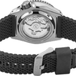 Contemporary stainless steel watch with textured rubber strap and exhibition case back showcasing intricate movement.