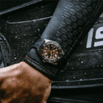 Stylish dive watch on a wetsuit wrist, showcasing adventure-ready design and water-resistant features.