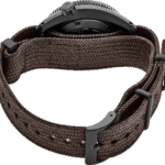Stylish rugged wristwatch with a dark case and woven brown strap for durability and elegance.
