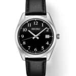 Elegant Seiko wristwatch with black dial, date function, and polished silver stainless steel case.