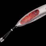 Stylish folding knife with metallic finish, wooden handle, and braided cord for utility.