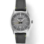 Seiko stainless steel watch with gray dial, luminescent markers, and durable fabric strap.