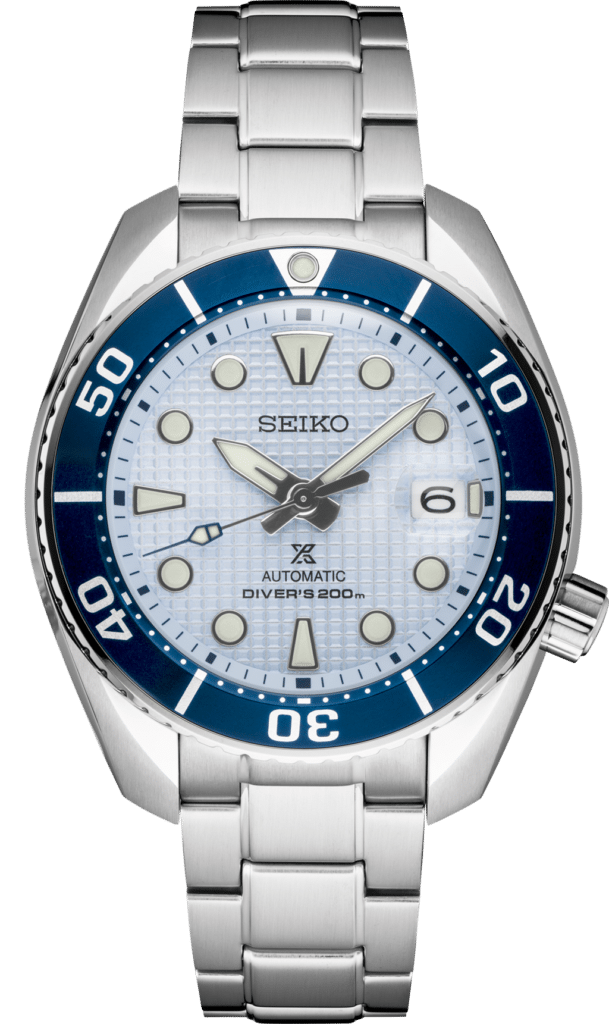 Seiko divers watch with stainless steel case, blue dial, and luminous hands for underwater adventures.