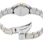 Elegant Seiko wristwatch with stainless steel and gold-tone accents, showcasing intricate design and craftsmanship.