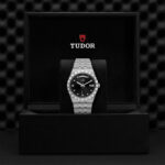 Tudor luxury watch in elegant box, showcasing timeless design and impeccable craftsmanship.