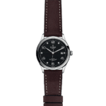 Luxurious Tudor wristwatch with stainless steel case, black dial, and brown leather strap.