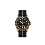 Elegant Tudor GMT watch with black dial, gold accents, and durable textile strap.
