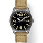 Stylish Seiko wristwatch with black dial, oversized markers, and durable khaki fabric strap.