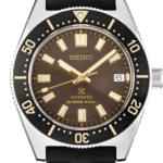 Seiko automatic divers watch with brown dial, stainless steel case, and black rubber strap.