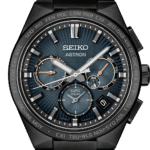 Elegant Seiko Astron watch with black stainless steel strap and deep blue sunburst dial.