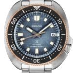 Seiko Divers 200m watch features a blue dial, robust design, and stainless steel bracelet.