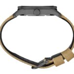 Stylish wristwatch with a matte gray case, leather and woven strap for durability and comfort.