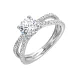 Elegant engagement ring with a large diamond and split shank design in white metal.