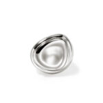 Shiny metallic bowl with a fluid design, perfect for modern decorative and functional use.