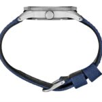 Stylish stainless steel wristwatch with blue fabric strap, perfect for casual or formal occasions.