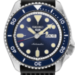 Seiko automatic diving watch with blue dial and durable rubber strap for outdoor adventures.