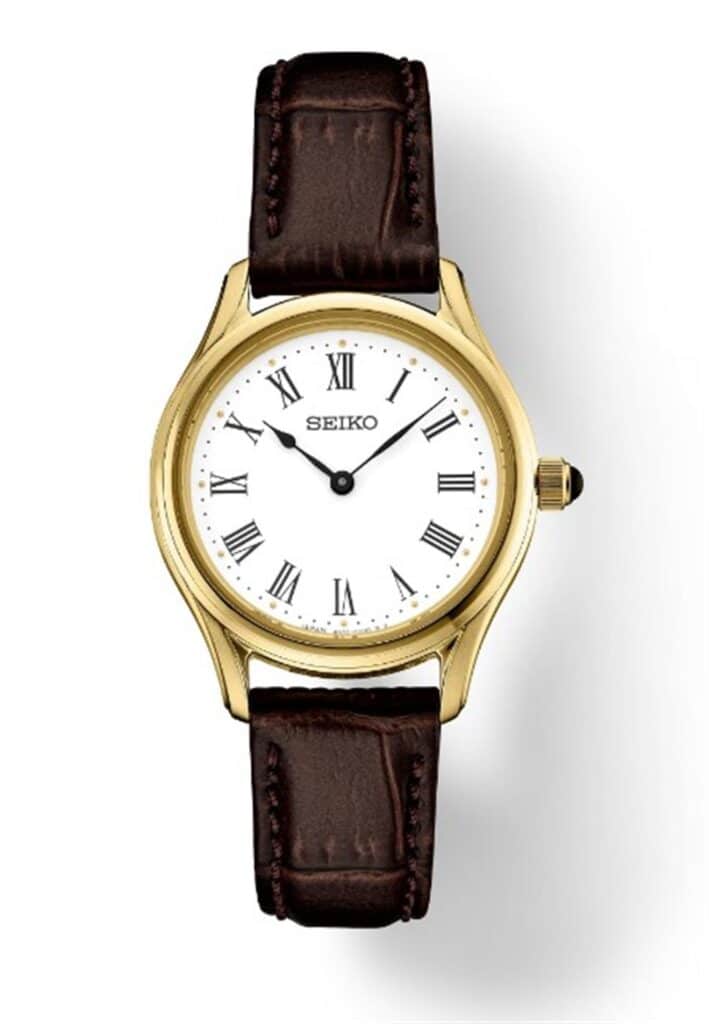 Elegant Seiko watch with gold case, white dial, and brown leather strap. Perfect for any occasion.
