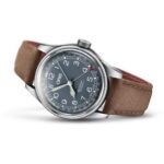 Oris Big Crown watch features stainless steel case, gray dial, oversized crown, and leather strap.
