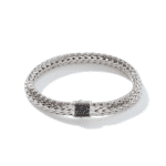 Elegant woven metallic bracelet with a polished finish and black stone accents for sophisticated style.